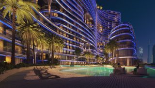 bâtiment de luxe lumières bleues nocturnes piscine palmiers
