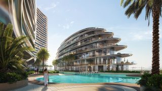 bâtiment moderne Aquarise avec piscine et palmiers