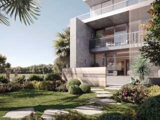 Extérieur moderne d'une maison de ville de luxe avec jardin vue sur mer