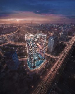 Vue aérienne du gratte-ciel illuminé de Binghatti Hills avec piscine
