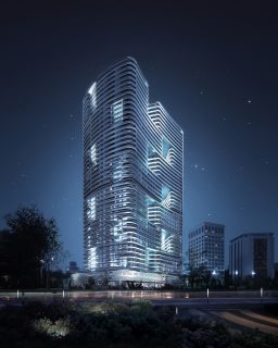 Vue nocturne de l'immeuble de grande hauteur moderne Binghatti Hills
