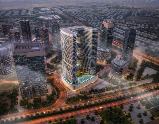 Vue aérienne d'une tour résidentielle moderne de grande hauteur avec horizon urbain