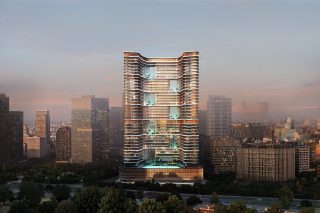 Gratte-ciel moderne avec balcons incurvés au coucher du soleil