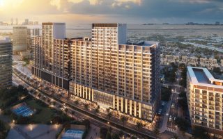 Vue aérienne des appartements Ruby au crépuscule avec illuminations
