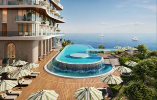Piscine à débordement luxueuse avec vue sur l'océan chez Sensia