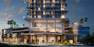 Immeuble moderne de grande hauteur avec entrée et balcons illuminés