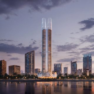 Gratte-ciel moderne au design curviligne avec palmiers