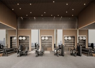 Vue intérieure de la salle de sport avec poids et ligne d'horizon de Dubaï