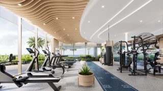 salle de sport moderne avec de grandes fenêtres et vues sur la verdure